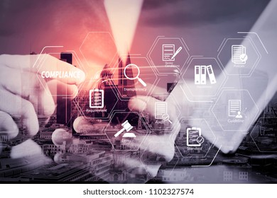 Compliance Virtual Diagram For Regulations, Law, Standards, Requirements And Audit.businessman Hand Working With Smart Phone And Laptop And Digital Tablet Computer In Modern Office.