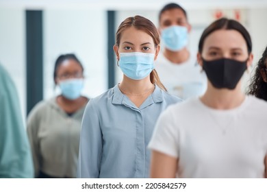 Compliance, Workers And Covid Rules In An Office With Colleagues Social Distancing And Standing In Unity. Trust, Management And Safety By Ambitious Employee Working Through A Pandemic Together