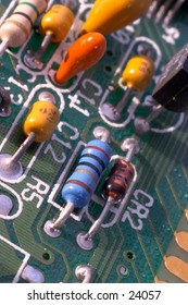 Components on a circuitboard from a 1989 286-model computer. Macro.