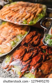 Composed Plates With Composed Fresh Seafood Wrapped In Plastic Film Before Serving