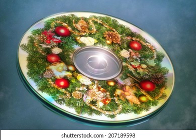 Composite Of A Christmas Wreath And Cd