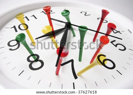 Composite of Clock and Golf Tees