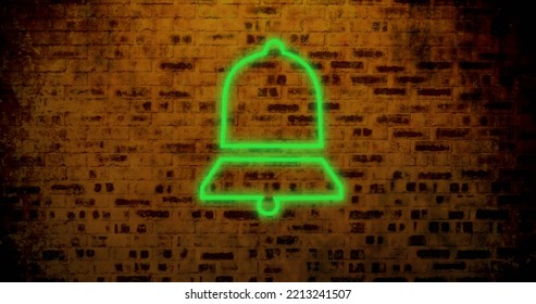 Composite of digital green notification bell icon glowing against old brick wall, copy space. Social media, information, reminder, illuminated, symbol and technology concept. - Powered by Shutterstock