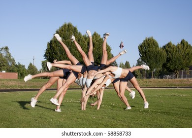 A composite of a female athlete performing a cartwheel on a grassy field. - Powered by Shutterstock