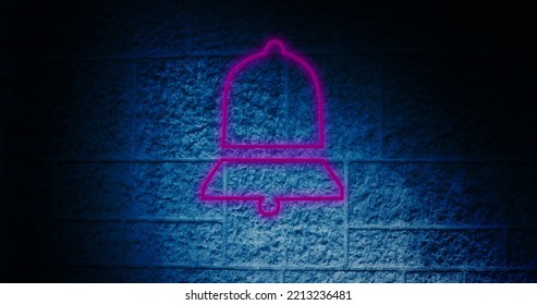 Composite of illuminated digital pink notification bell icon against blue wall, copy space. Dark, social media, information, reminder, symbol and technology concept. - Powered by Shutterstock