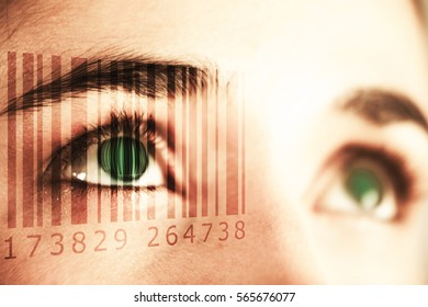 Composite image of Bar code against close up of woman with brown eyes