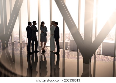 Composite Image Of Business Colleagues Talking In Large Room Overlooking City