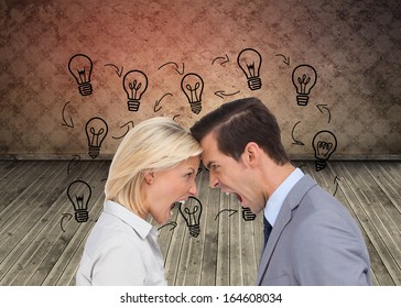 Composite image of colleagues quarreling head against head - Shutterstock ID 164608034