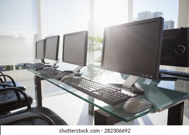 Composite Image Of Computer In Front Of Window In Office