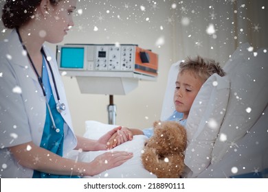 Composite Image Of Female Doctor Examining A Child In Bed Against Snow Falling