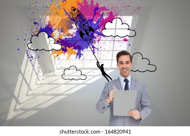 Composite Image Of Happy Businessman Holding A Clipboard