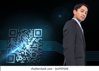 Composite image of serious asian businessman 