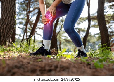 Composite of images of woman trekking in the forest holding her sore knee from arthritis and x-ray bones - Powered by Shutterstock