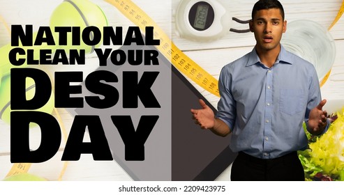 Composite of national clean your desk day text and surprised biracial man gesturing against desk. Office, desk, instrument of measurement, hygiene, awareness, celebration and technology. - Powered by Shutterstock