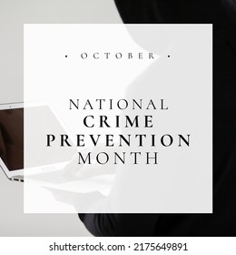 Composite Of Person In Hood Using Laptop And October With National Crime Prevention Month Text. Copy Space, Cyber Crime, Internet, Wireless Technology, Protection, Awareness And Alertness Concept.