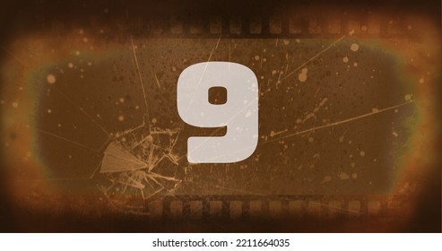 Composite of white colored number 9 text over scratched old negative camera film, copy space. Digits, counting, abstract, retro, damaged, filmstrip and photography concept. - Powered by Shutterstock