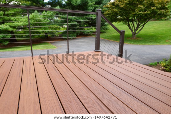 Composite Wood Deck with\
Metal Railing