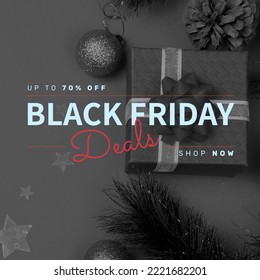 Composition of up to 70 percent off black friday deals shop now text over present and decorations. Black friday, shopping and retail concept digitally generated image. - Powered by Shutterstock