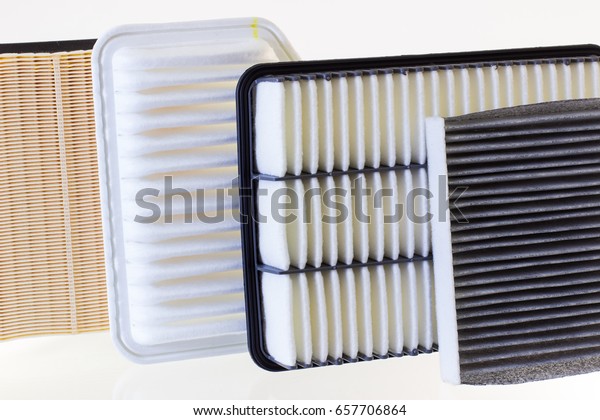 composition of air filters for car engine on a\
white background
