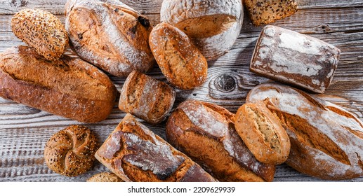 Composition With Assorted Bakery Products On Wooden Table.