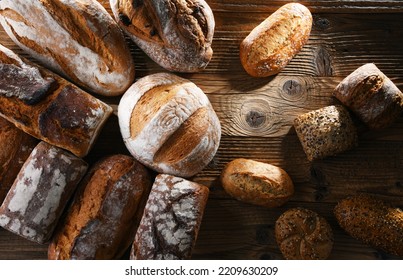 Composition With Assorted Bakery Products On Wooden Table.