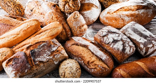 Composition With Assorted Bakery Products On Wooden Table.