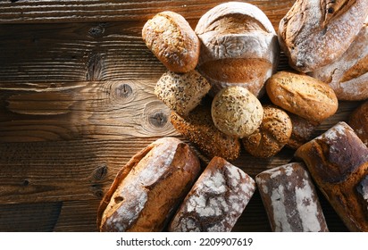 Composition With Assorted Bakery Products On Wooden Table.