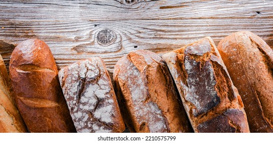 Composition With Assorted Bakery Products On Wooden Table.