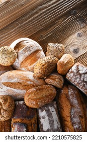 Composition With Assorted Bakery Products On Wooden Table.