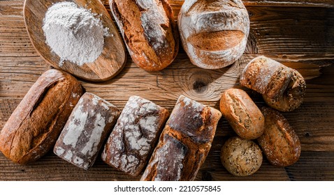 Composition With Assorted Bakery Products On Wooden Table.