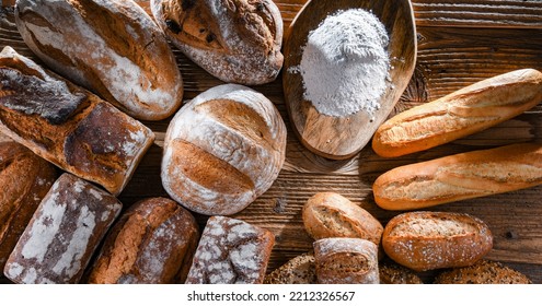 Composition With Assorted Bakery Products On Wooden Table.