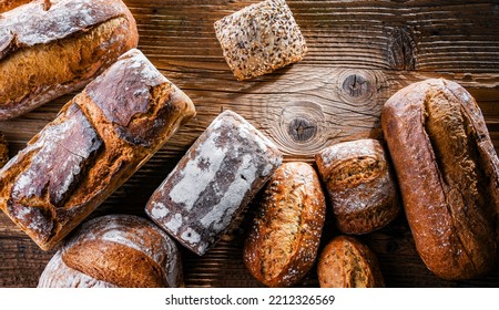 Composition With Assorted Bakery Products On Wooden Table.