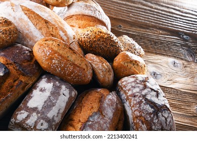 Composition With Assorted Bakery Products On Wooden Table.