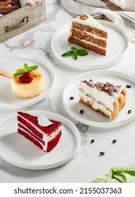 Composition with assorted cakes. Set of dessert: cheesecake, red velvet, tiramisu, carrot cake. Popular dessert in aesthetic composition. Pieces of cakes: red velvet, tiramisu, cheesecake, carrot cake
