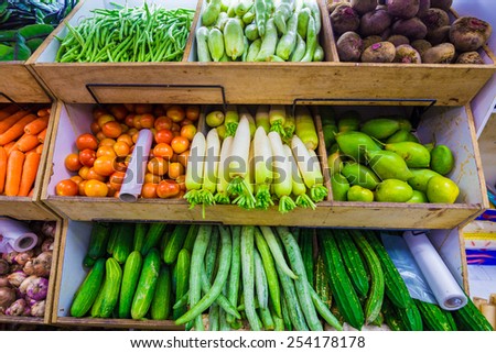 Composition with assorted fresh raw organic vegetables in little india market, Singapore
