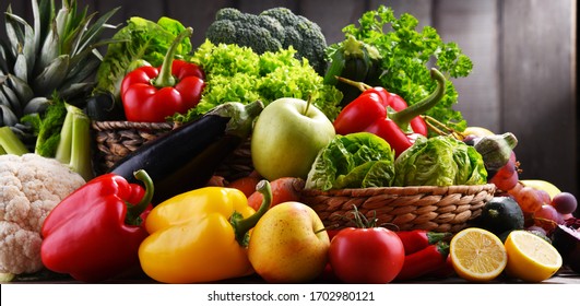 Composition with assorted organic vegetables and fruits. - Shutterstock ID 1702980121