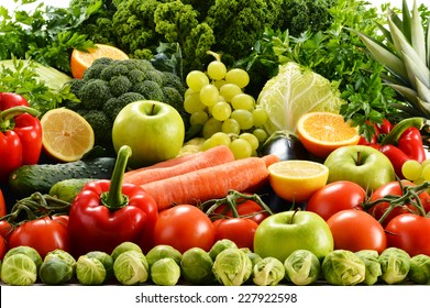 Composition with assorted raw organic vegetables - Shutterstock ID 227922598
