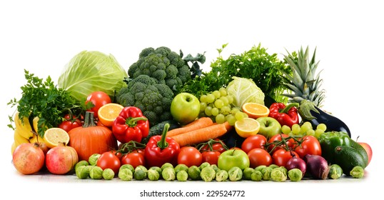 Composition with assorted raw organic vegetables isolated on white - Shutterstock ID 229524772