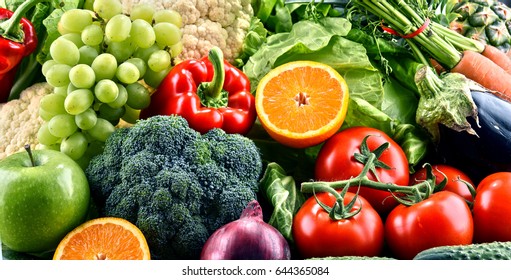 Composition with assorted raw organic vegetables and fruits. Detox diet - Shutterstock ID 644365084