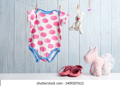 Composition With Baby Accessories On Wooden Background