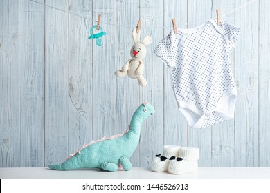 Composition With Baby Accessories On Wooden Background