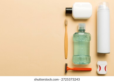 Composition with bath cosmetics on table. razor, toothpaste, soap, gel, toothbrush, mouthwash and other various accessories. Cosmetics for skin health. Bath Mockup for your logo.