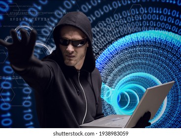 Composition of binary coding over hacker in hood using laptop. online security and cyber attack concept digitally generated image.