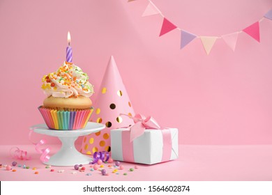 Composition With Birthday Cupcake On Pink Background