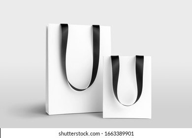 Composition Of Blank Shopping Bags Mockup With Ribbon Hangers To Place Your Design. Front View On White Background. Fashion Branding Scene.