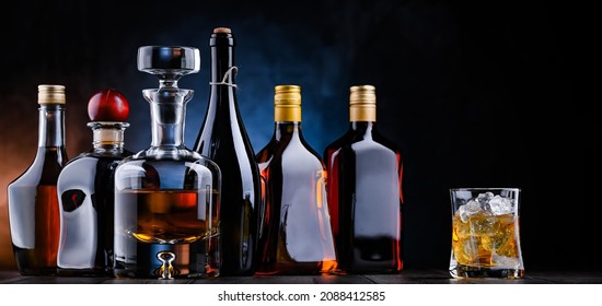 Composition With Bottles Of Assorted Alcoholic Beverages.