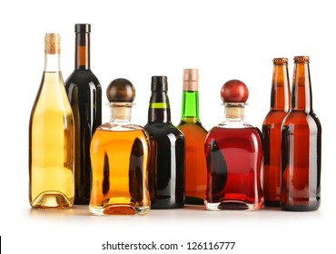 Composition with bottles of assorted alcoholic products isolated on white