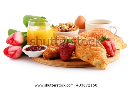 Composition with breakfast on the cutting board isolated on white