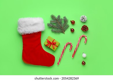 Composition with Christmas sock on color background - Powered by Shutterstock