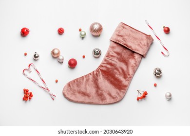 Composition with Christmas sock on white background - Powered by Shutterstock